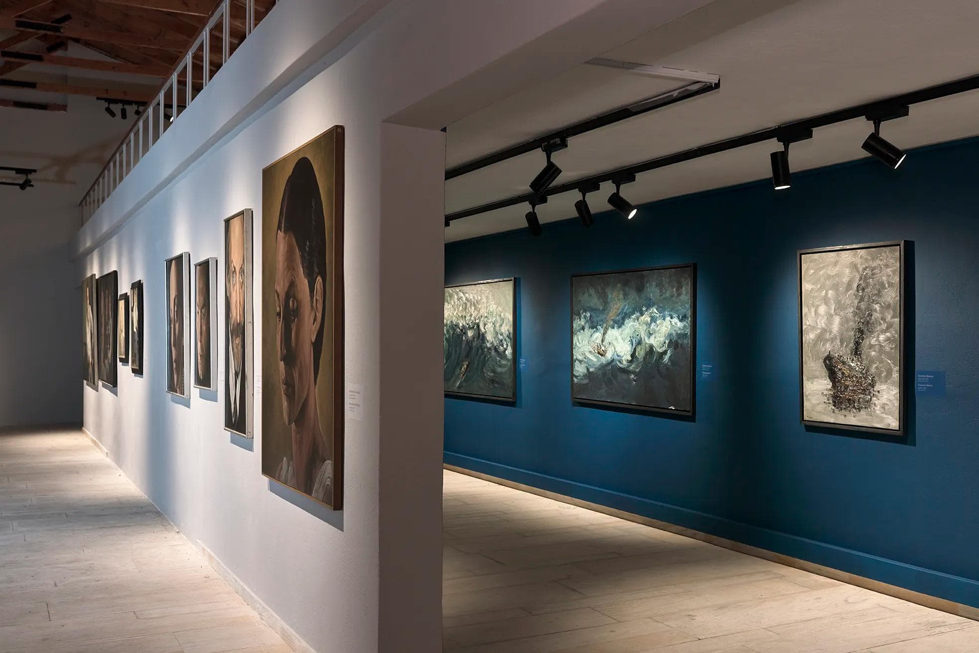 paintings accros the wall in a Hall into the Othonian Court