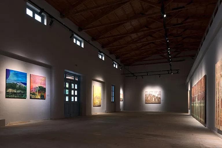 a room with paintings into the Othonian Court