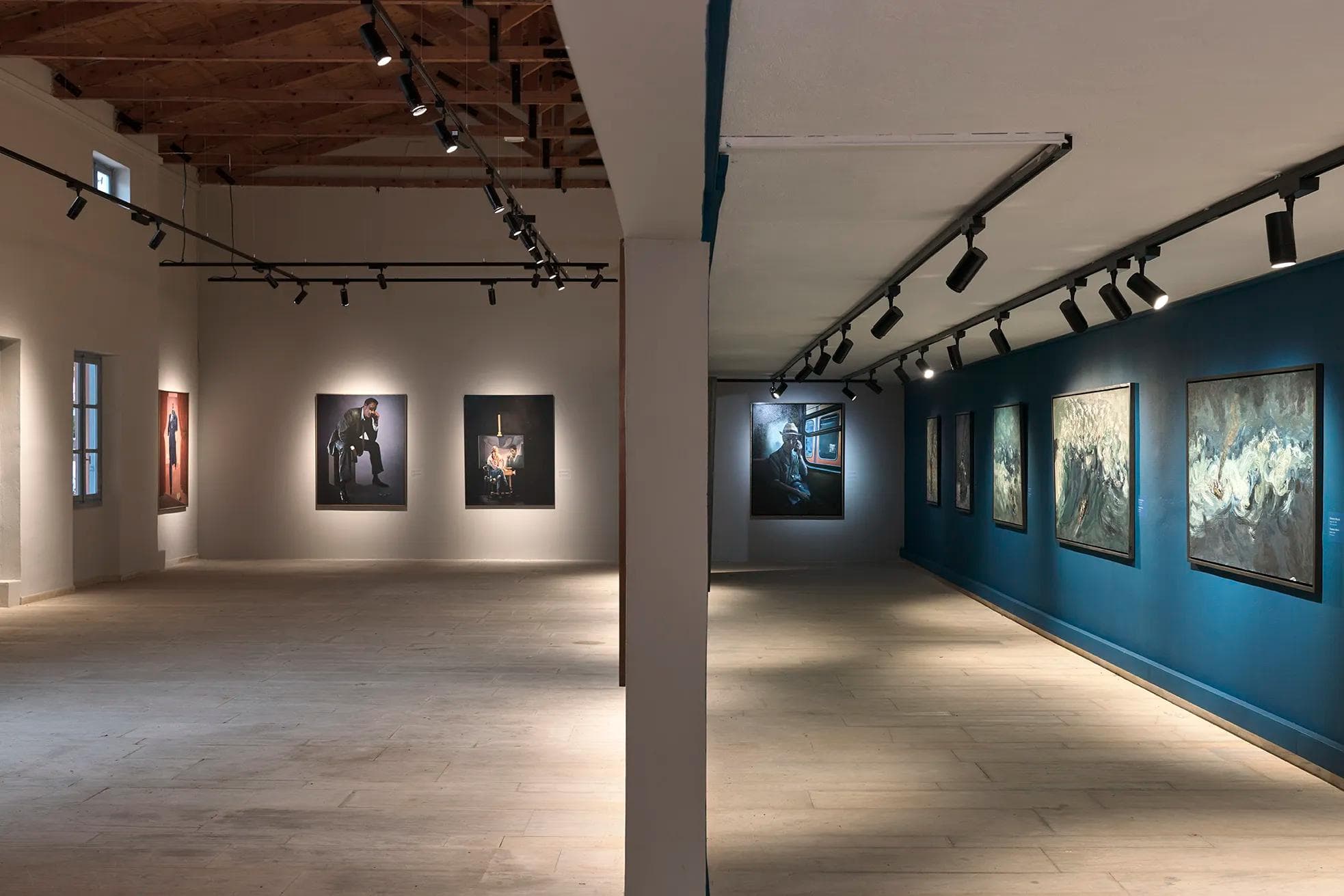 paintings accros the wall in a room into the Othonian Court